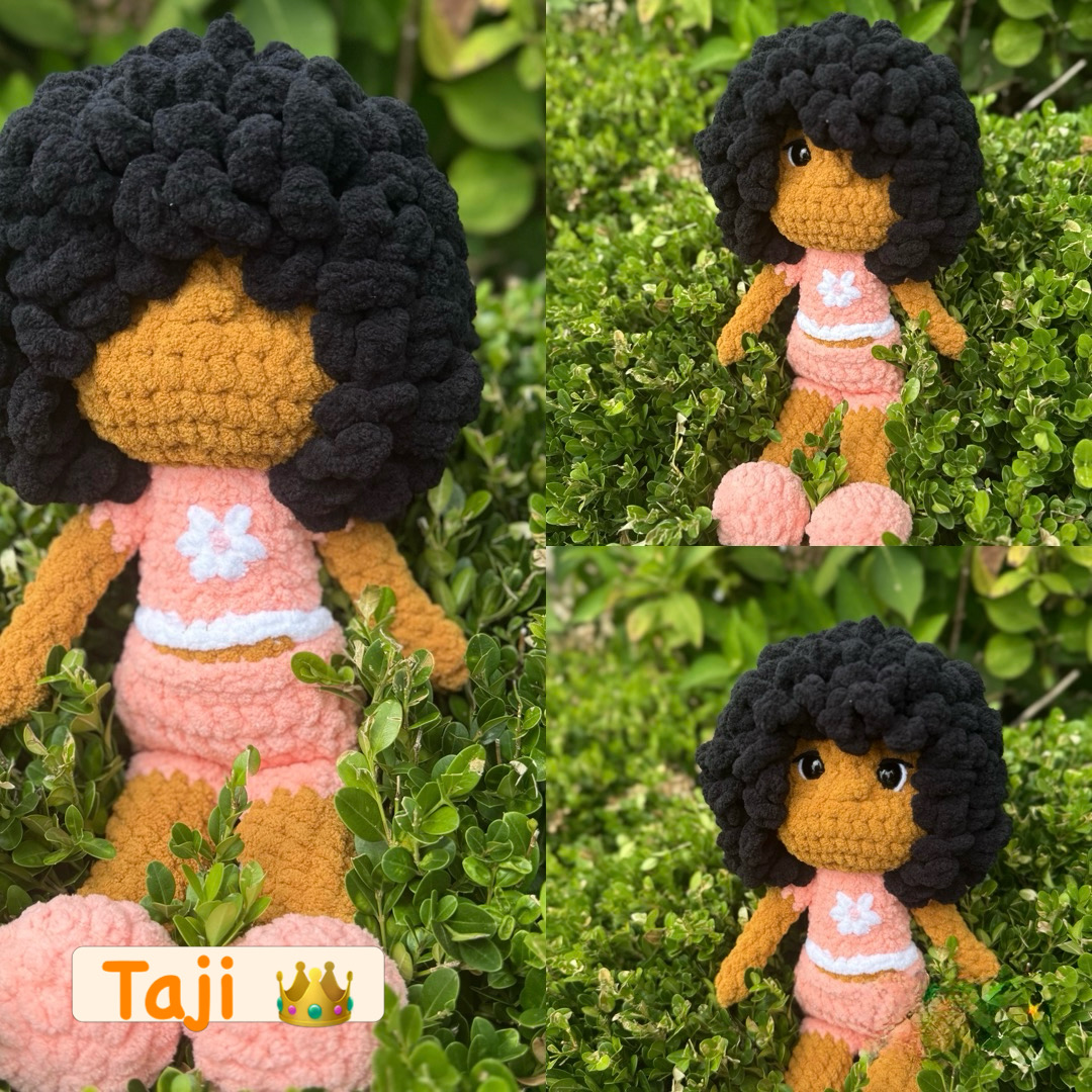 Taji, a handmade crochet doll photographed in a garden